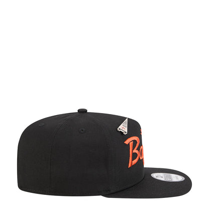 Black baseball cap with orange Bagwell script and team logo patch on side