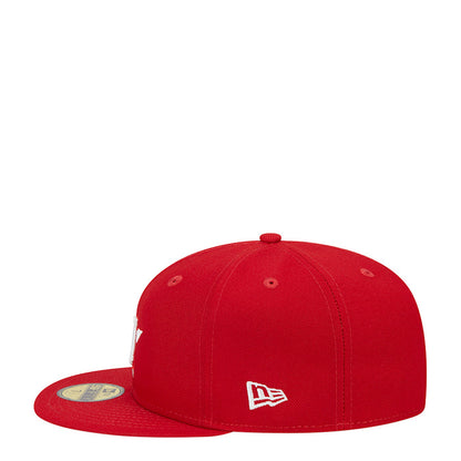 Red baseball cap with white New Era flag logo on side