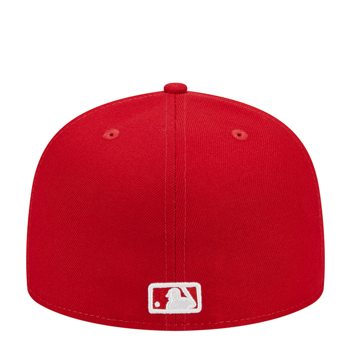 Red baseball cap with white MLB shield logo on front