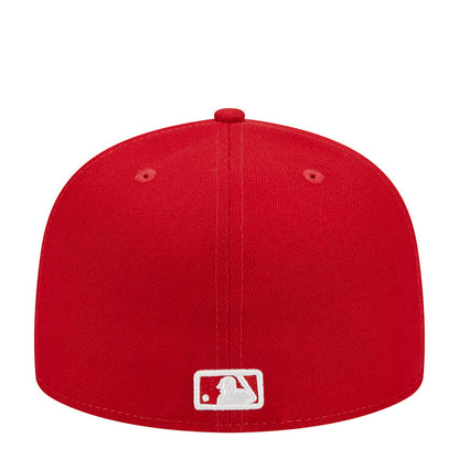 Red baseball cap with white MLB shield logo on front