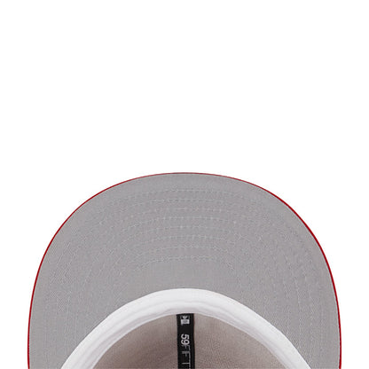 Gray baseball cap showing white inner band and stitching detail at top