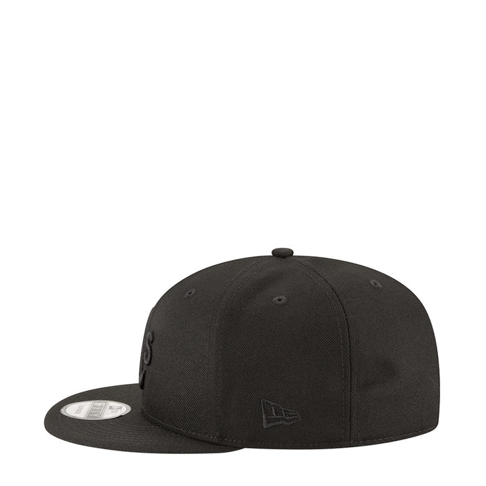 Black baseball cap with New Era flag emblem on front side