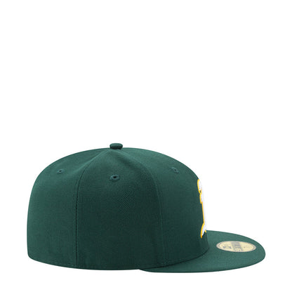 Green baseball cap with side logo detail and curved brim