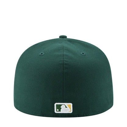 Green baseball cap with white logo patch on back panel