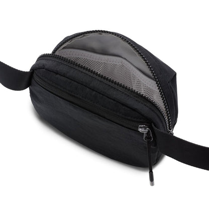 Black oval crossbody bag with top zipper and mesh-lined interior panel