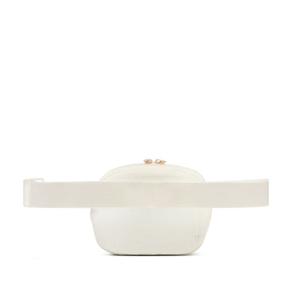 Cream oval crossbody bag with flat white adjustable strap and top zipper
