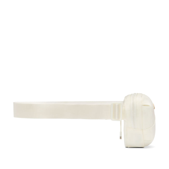 Cream oval crossbody bag with wide strap and zippered back panel