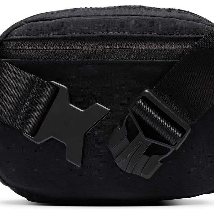 Gunmetal clasp and strap attachment hardware on black oval crossbody bag