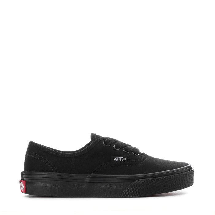 Kids black Vans lace-up sneaker with rubber sidewall and Vans logo near the heel