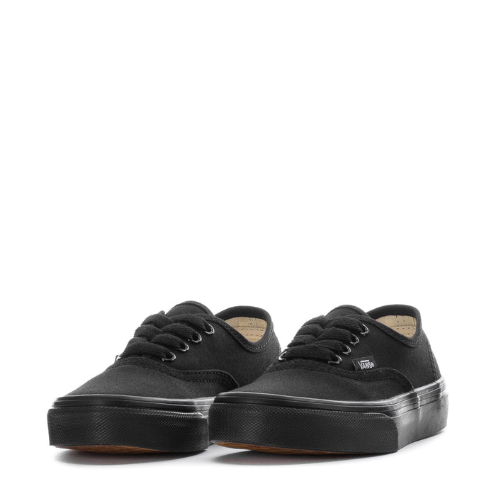 Pair of kids black Vans lace-up sneakers, front and side angle view