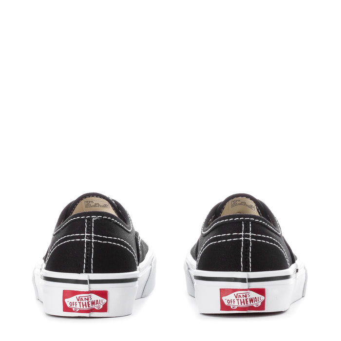 Kids' Vans black sneakers with white midsoles and 'Off the Wall' heel label