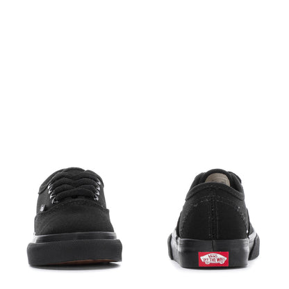 Toddler black low-top sneakers, heel and back view with Vans logo patch