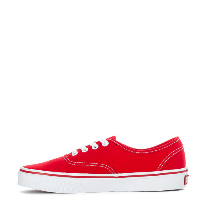 Youth red low-top sneakers with white lace-up, contrast stitching, and white sidewall