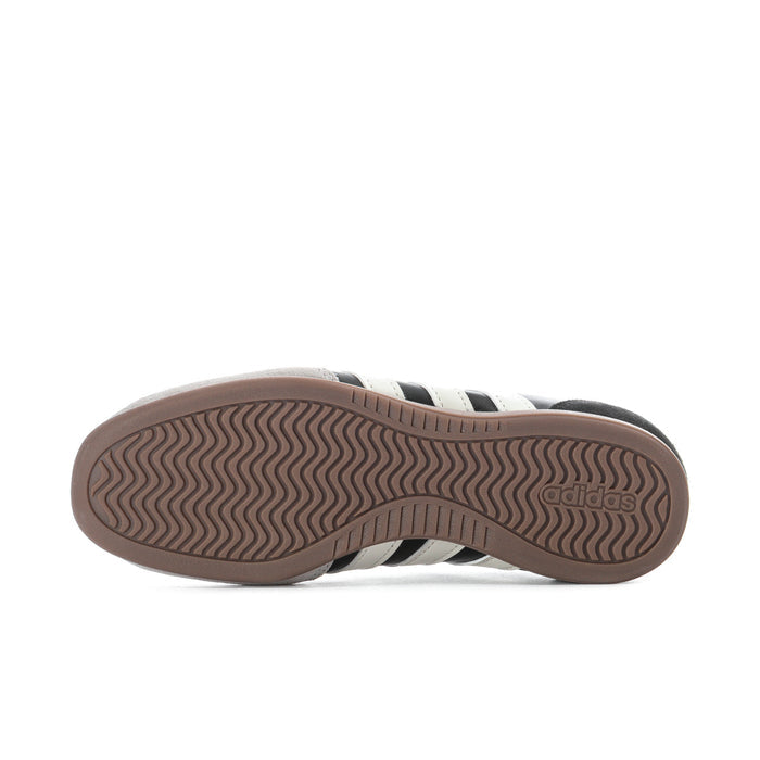 Women’s mary jane sneaker outsole view, brown tread with Adidas branding