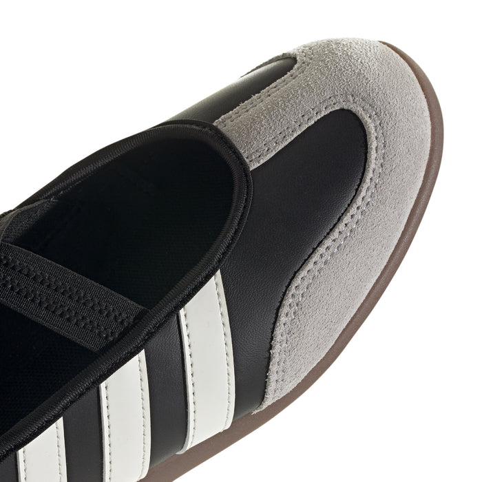 Women’s mary jane sneaker side detail, black and light gray suede panels with stripes