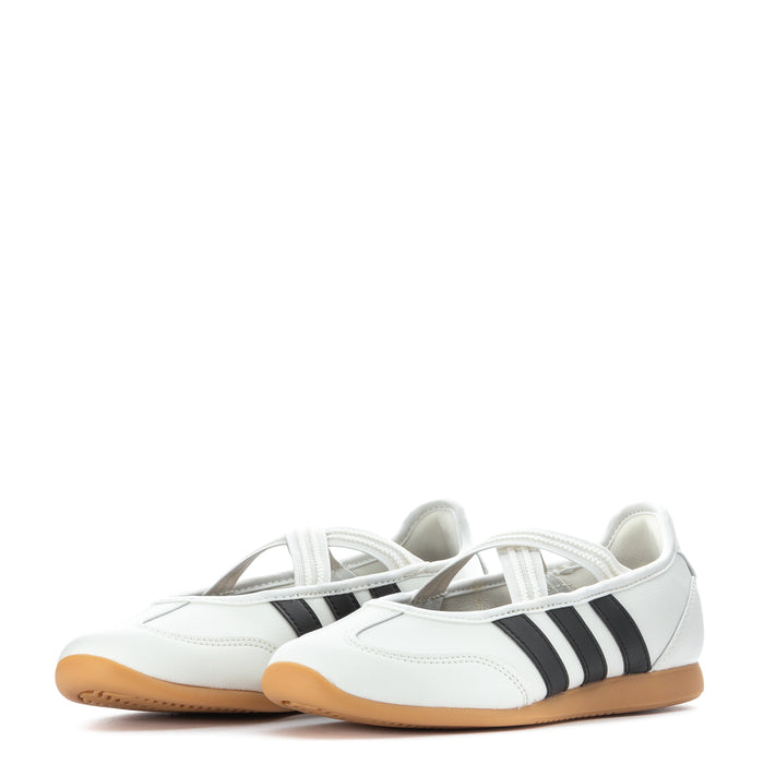 Youth Mary Jane sneakers, white with black stripes and tan gum outsoles.