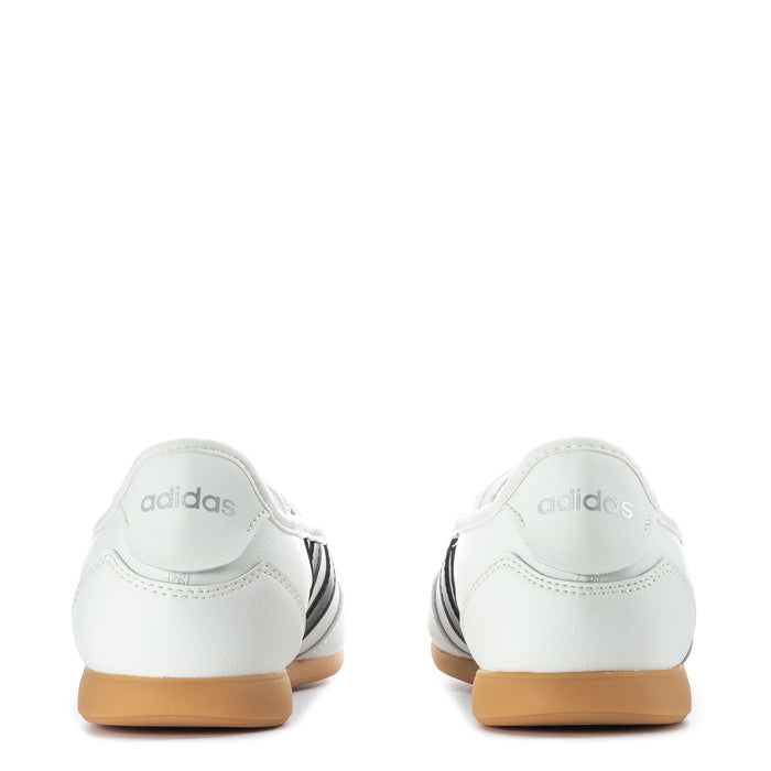 Youth Mary Jane sneakers, white back view with adidas logo and tan gum heel.