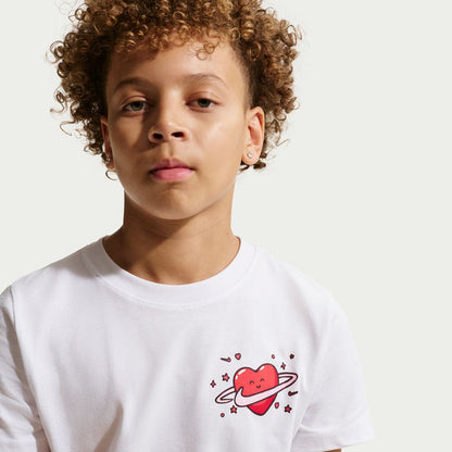 White youth crewneck T-shirt with red heart planet graphic and sparkle details