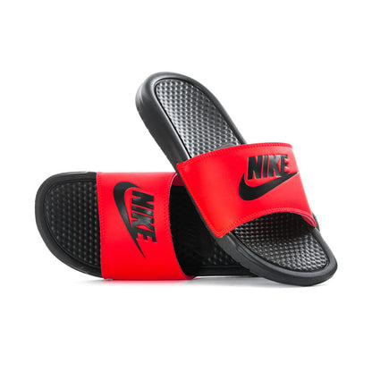 Red and black slide sandals with textured footbed and Nike branding