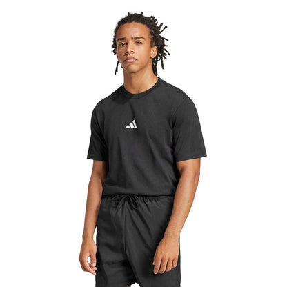 Men's black crewneck t-shirt with small white adidas logo; short sleeves