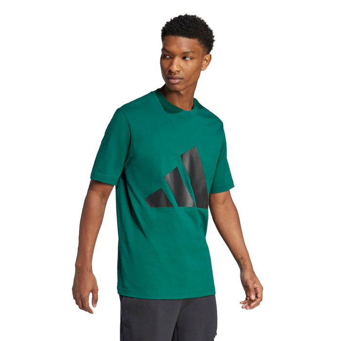 Men's collegiate green graphic T-shirt on model, front view