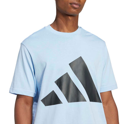 Men's light blue T-shirt close-up of black triangular logo graphic
