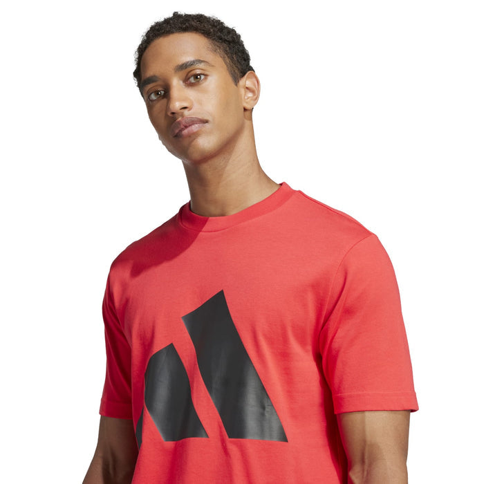 Men's red crewneck T-shirt with large black graphic logo detail on chest