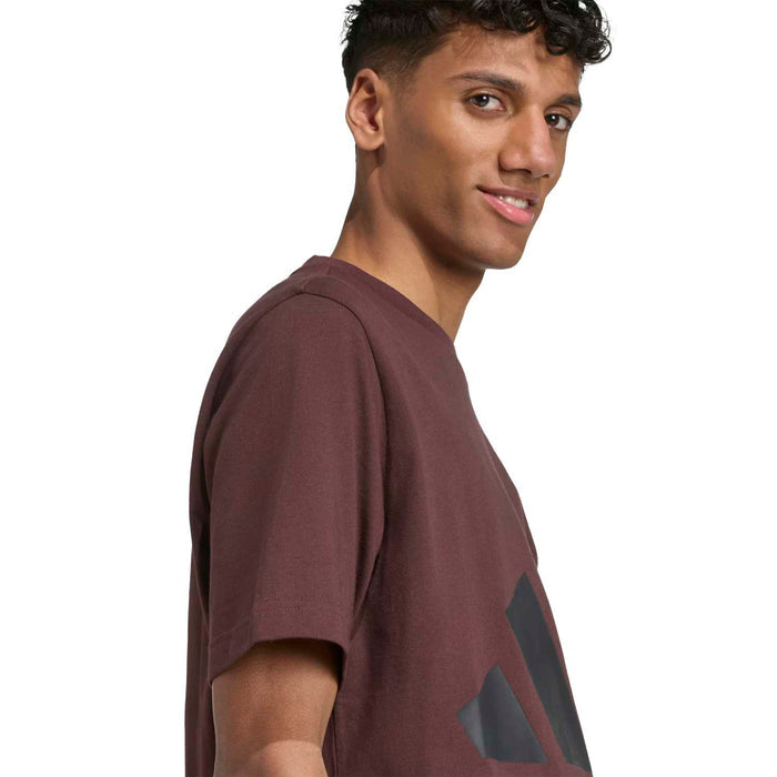 Men's brown crew-neck T-shirt with blue-gray logo graphic, side view