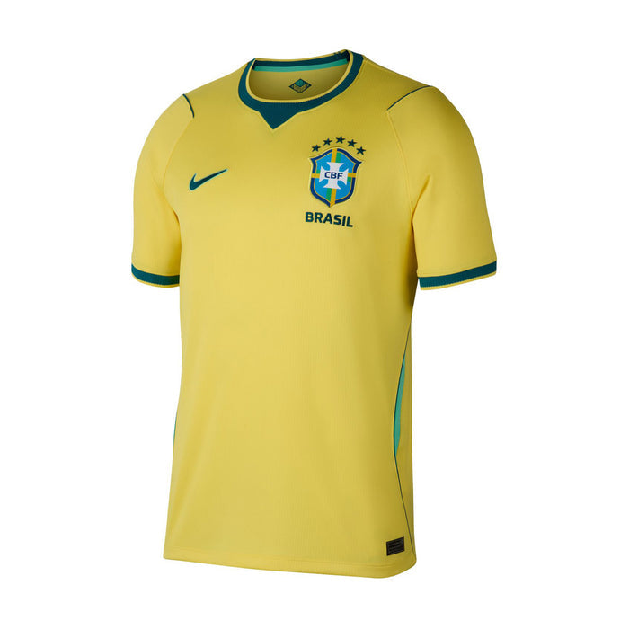 Yellow Brazil home soccer jersey with teal trim, CBF crest, and stars