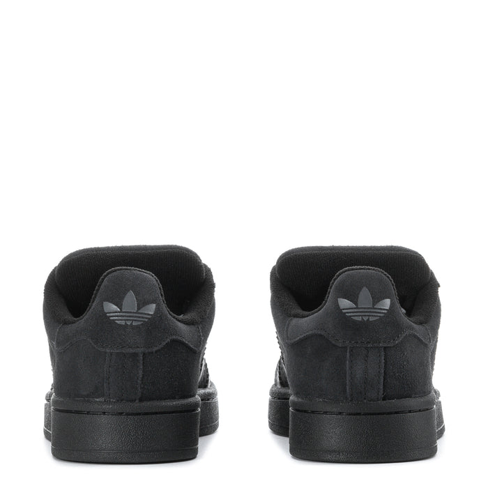 Black youth sneakers with heel view and trefoil logo on the back