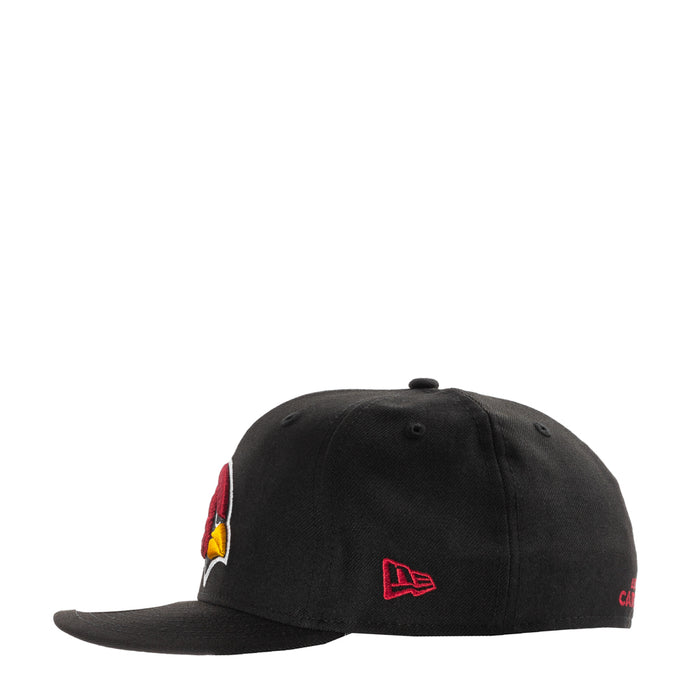 Black baseball cap with New Era flag logo and partial Arizona Cardinals bird