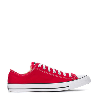 Red low-top Converse sneakers with white eyelets and rubber toe cap