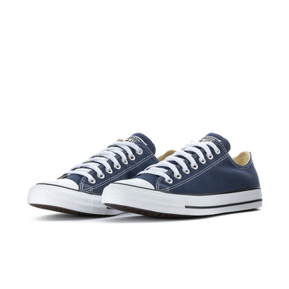 Men's navy canvas low-top sneakers with white laces and rubber toe cap
