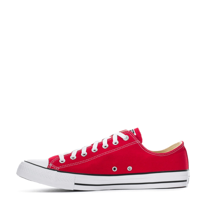 Men's red low-top Converse sneakers with white laces and rubber toe cap