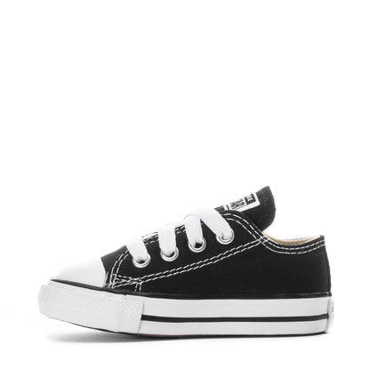 Toddler black canvas Chuck Taylor All Star sneakers, angled side with white lace-up front