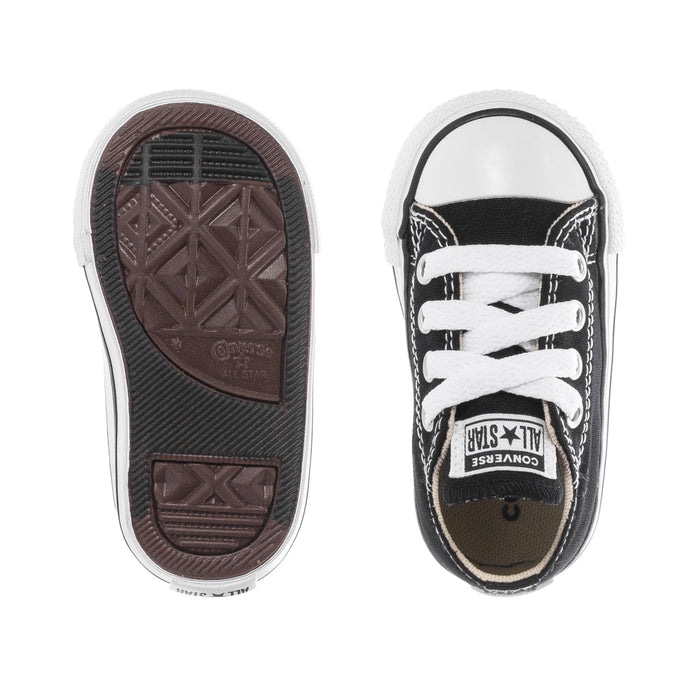 Toddler Chuck Taylor All Star ox sneakers in black with white laces and rubber toe bumper