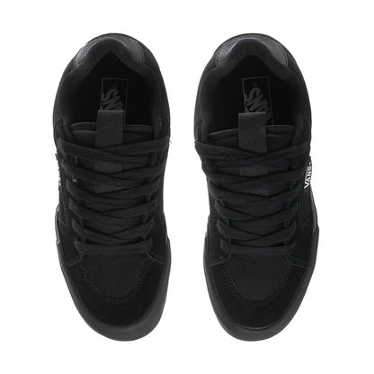 Black chukka-style sneakers with lace closure and padded collar, Vans logo