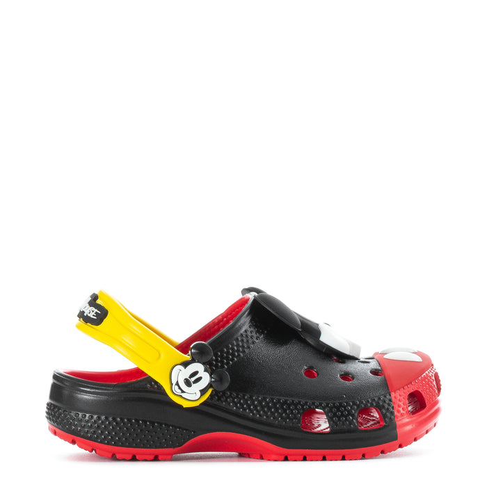 Kids’ black clog with Mickey Mouse face, red accents, and yellow heel strap