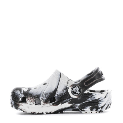 Toddler clog with black-and-white marble print and adjustable strap detail.