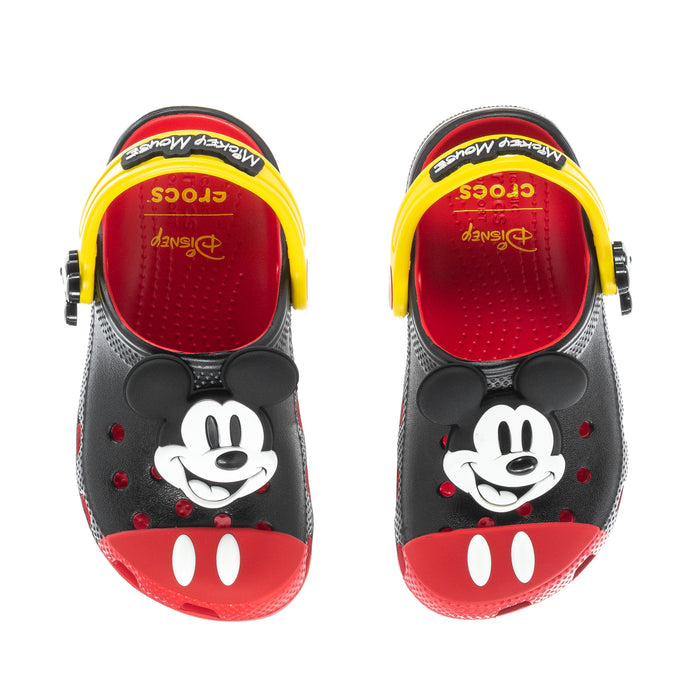 Kids’ black clogs with Mickey Mouse graphics and yellow trim, red interior