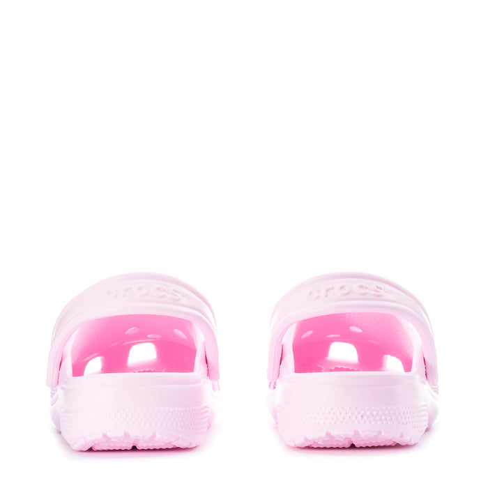 Women's pink clog pair, back view with raised heel and embossed grip texture