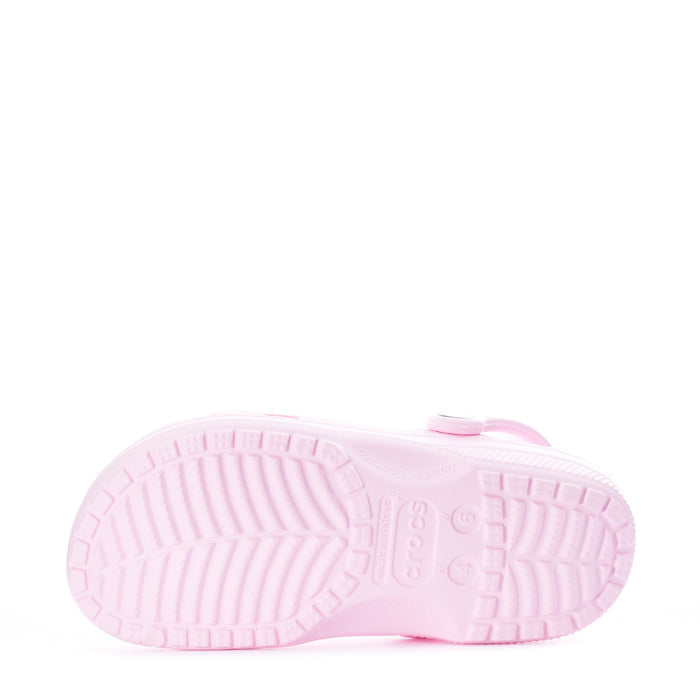 Women's pink clog outsole view with textured tread pattern