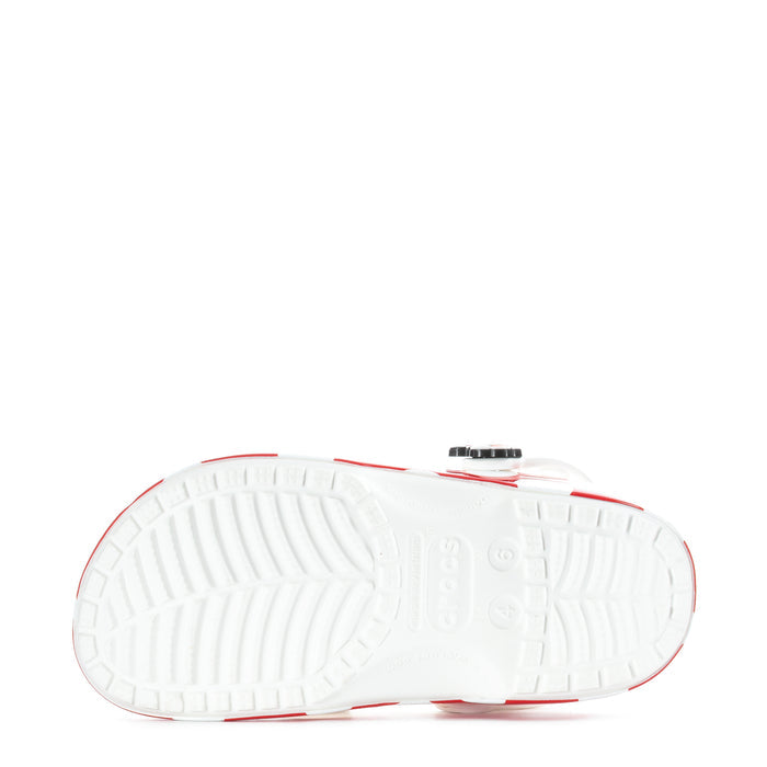 White clog outsole with textured tread and red trim