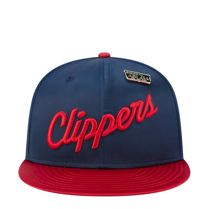 Two-tone satin baseball cap in navy with red brim and red Clippers script