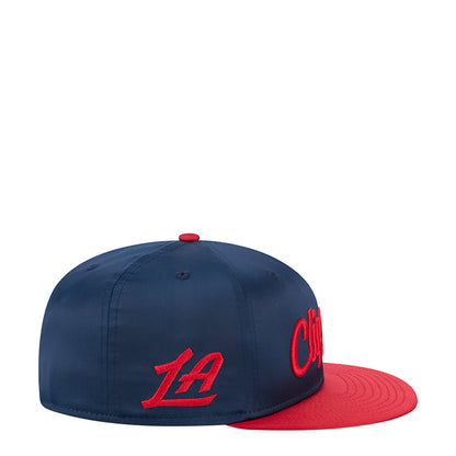 Two-tone satin baseball cap with red brim and red LA logo on navy crown