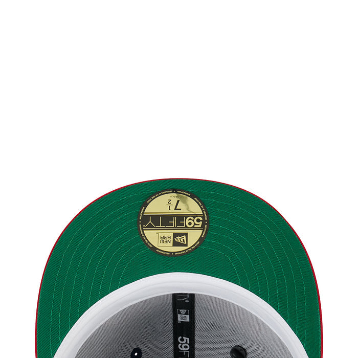Green satin baseball cap top with circular label and stitched panel texture