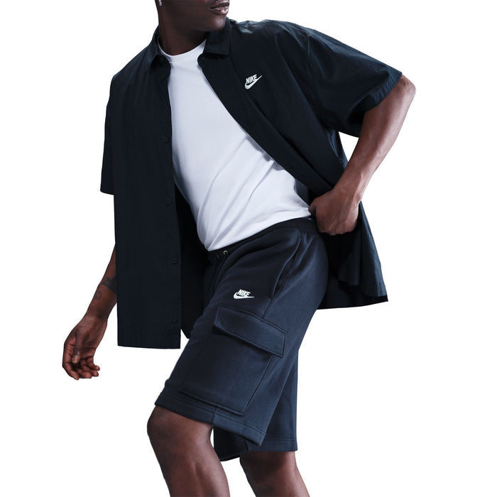 Men's dark navy cargo shorts with flap cargo pocket and Nike logo on pocket