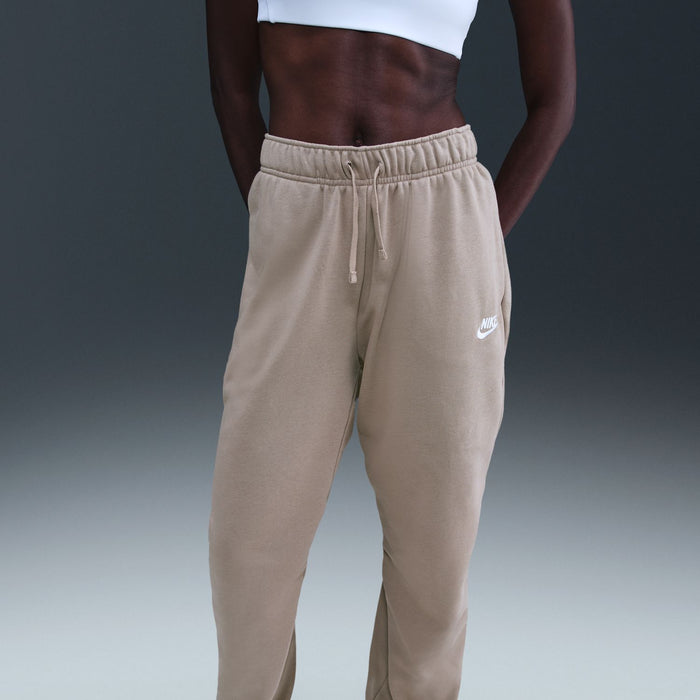 Women's fleece sweatpants in malt beige with drawstring waistband and Nike side logo