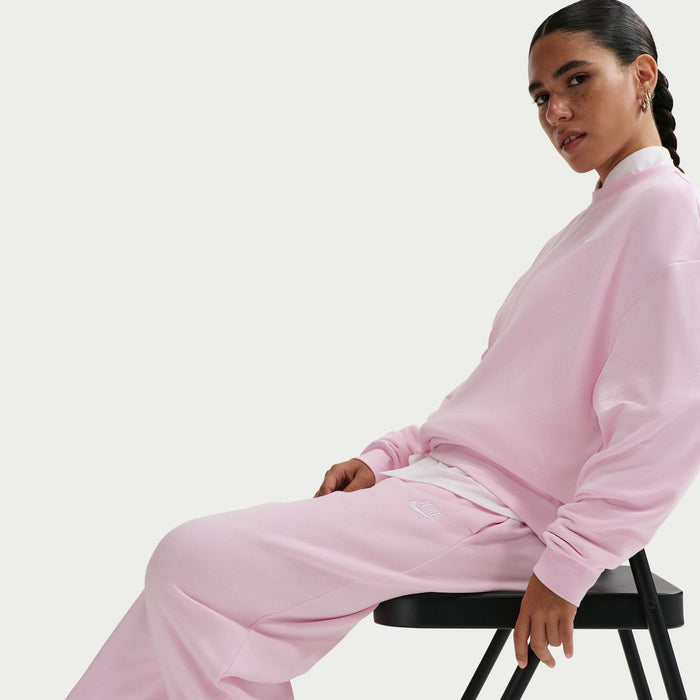 Women’s pink fleece jogger pants with relaxed drape and tapered leg openings