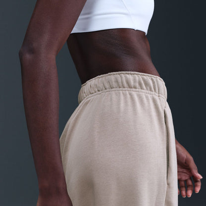 Women's fleece sweatpants, malt beige with elastic drawstring waistband and side logo